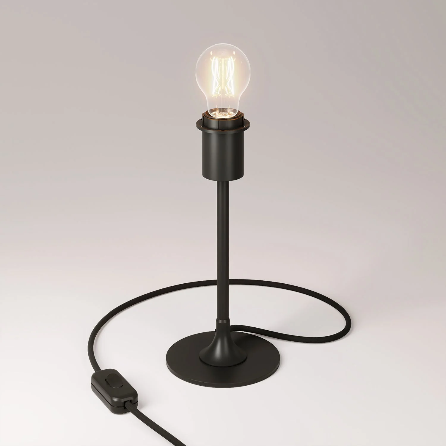 Lampada da tavolo MAG-Y con base metallica tonda, predisposizione per paralume e spina UK - Nero